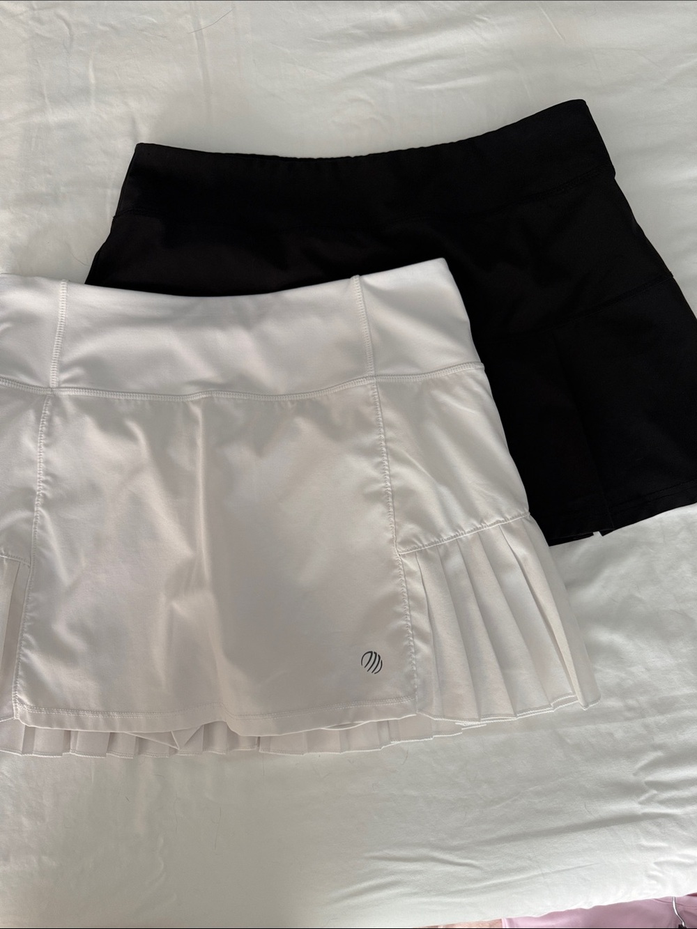 Women's Black and White tennis skirt and pink top